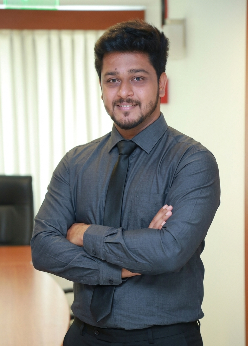 Enamullah T. in the office